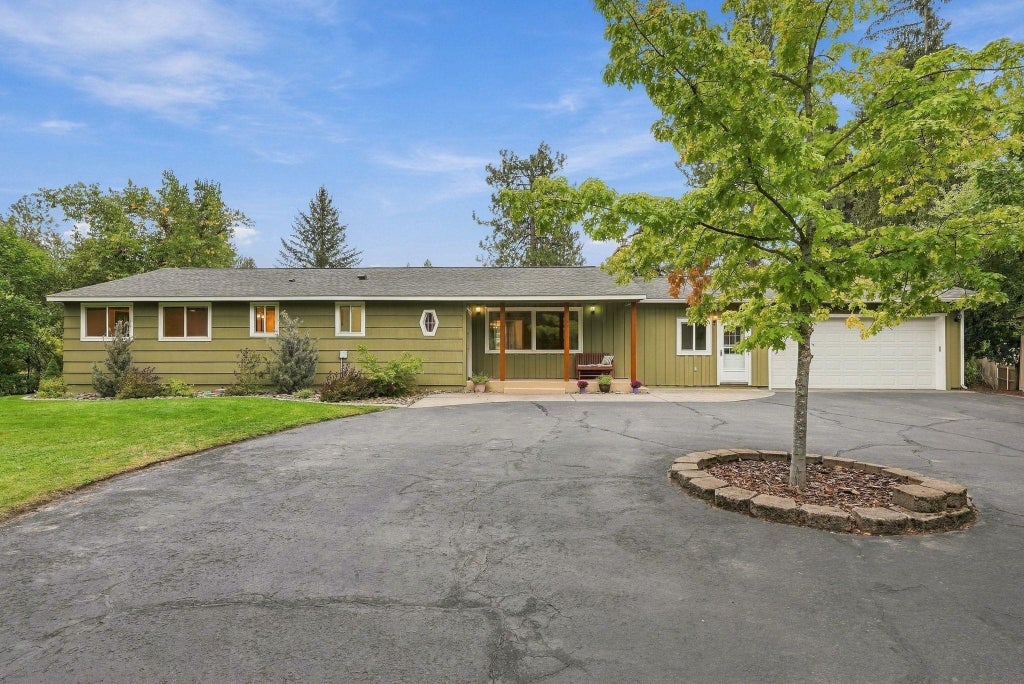 Photo of 307 W Graves Rd, Spokane, WA 99218 (MLS # 202624374)