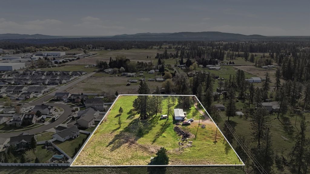 Photo of 6404 W 48th Ave, Spokane, WA 99224 (MLS # 202615780)