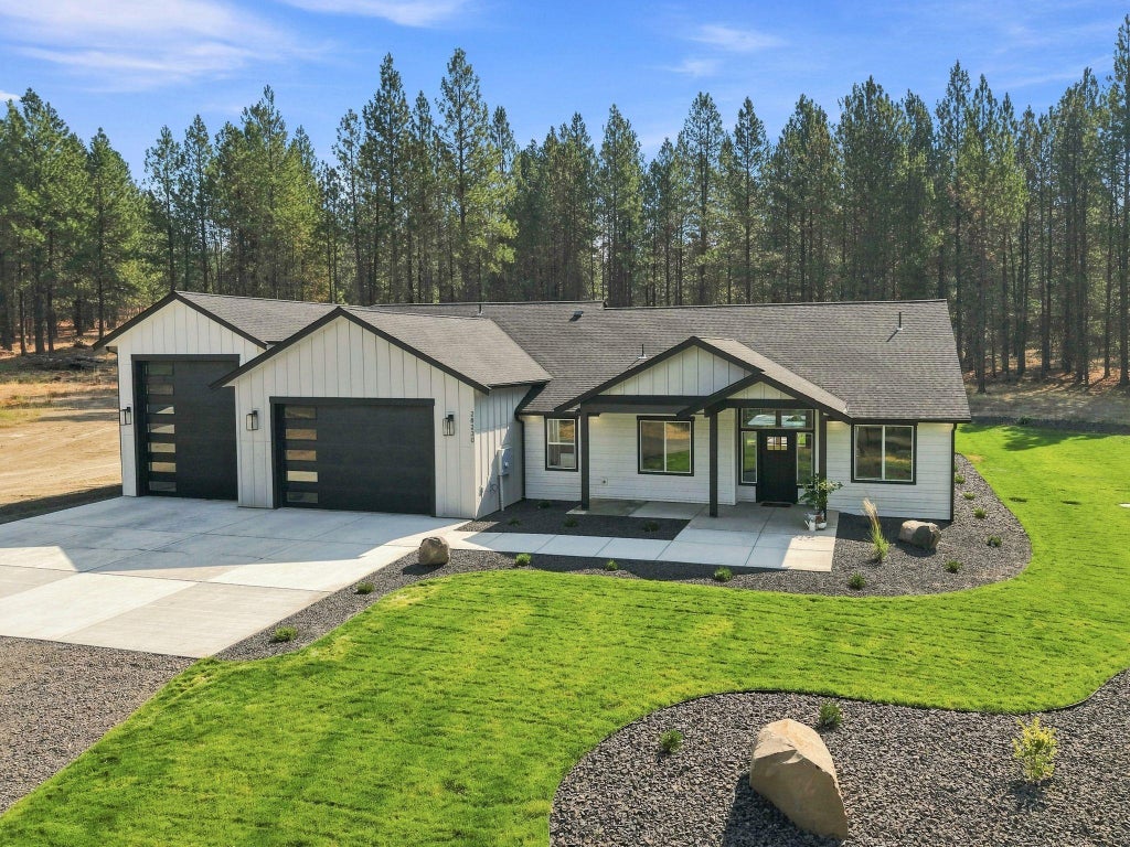 Photo of 28230 N Hardesty Rd, Chattaroy, WA 99003 (MLS # 202623441)