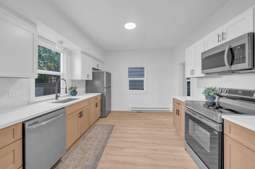 Photo of 1512 E Dalton Ave, Spokane, WA 99207 (MLS # 202626018)