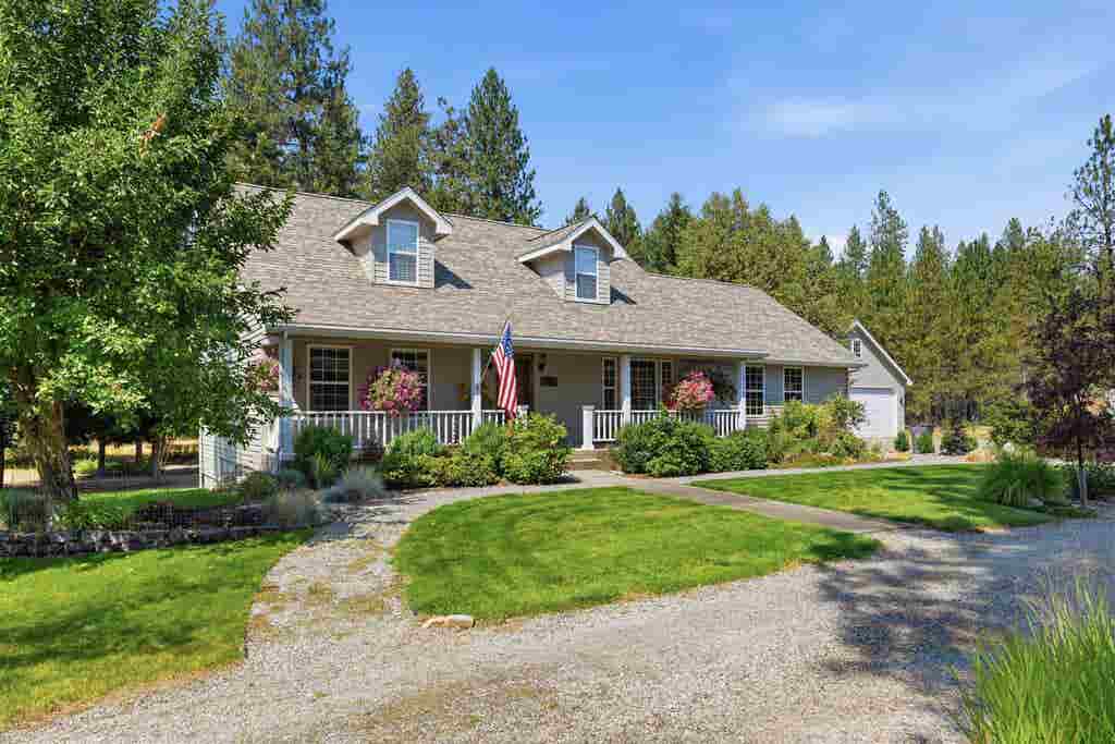 Photo of 28013 N Bear Lake Rd, Chattaroy, WA 99003 (MLS # 202622957)