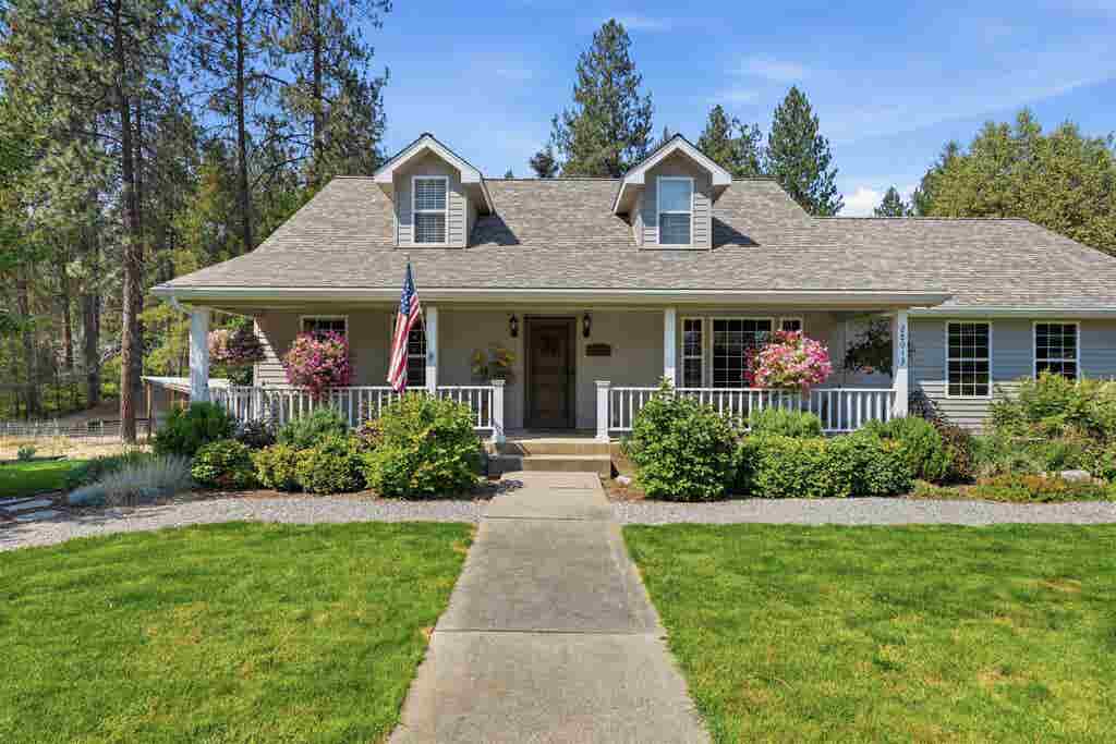 Photo of 28013 N Bear Lake Rd, Chattaroy, WA 99003 (MLS # 202622957)