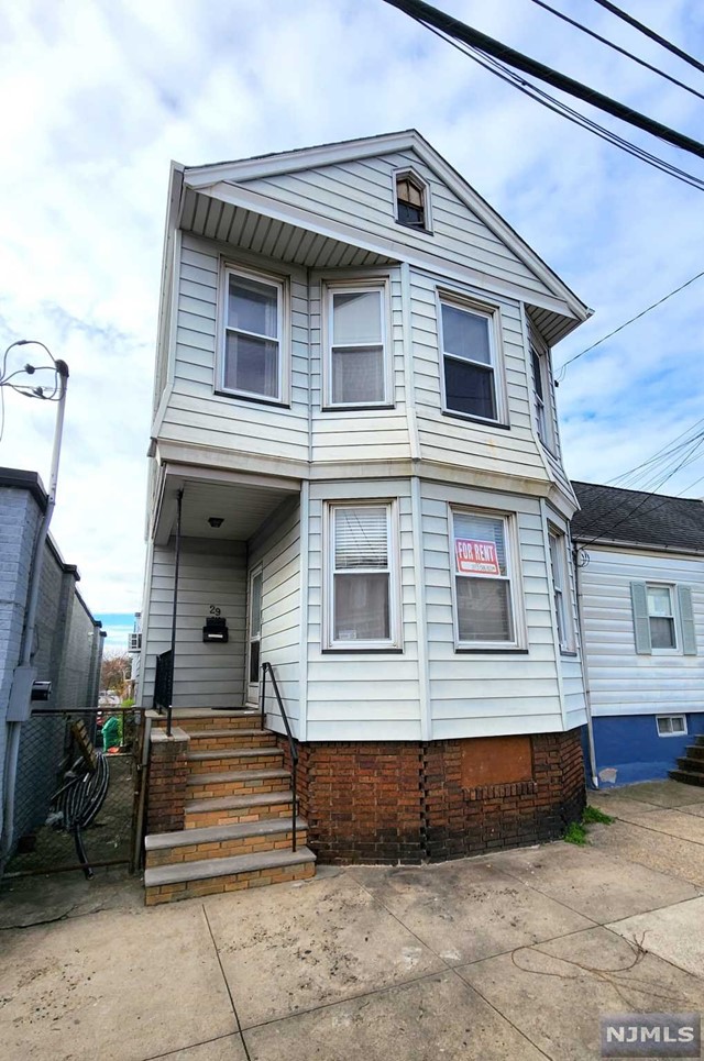Rental Property at 29 Davis Street 1st 2nd Fl, Harrison, New Jersey - Bedrooms: 4 
Bathrooms: 2 
Rooms: 8  - $2,850 MO.