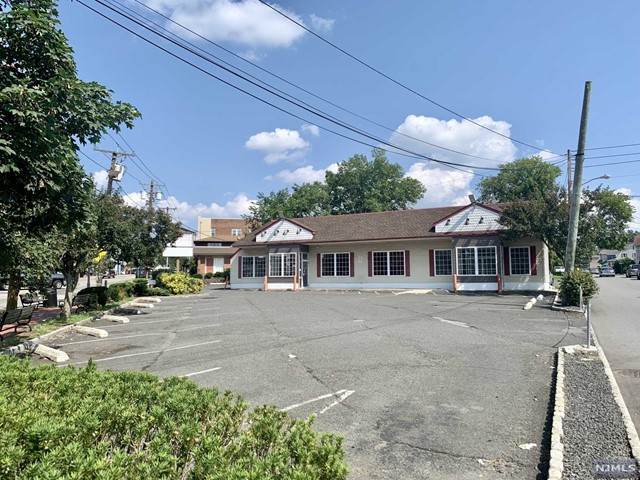 High visibility corner retail location with a private parking lot in downtown Maplewood! The property is set up with 2 entrances so there could be multiple businesses in 1 location. The existing space has a kitchen in the back of the building with a walk-in box, previous tenants were Dunkin Donuts & Blimpie. There is a door for loading on the left side of the building. Perfect for restaurants, retail, office and even cannabis is a permitted use. Bus stop located directly outside of the building.