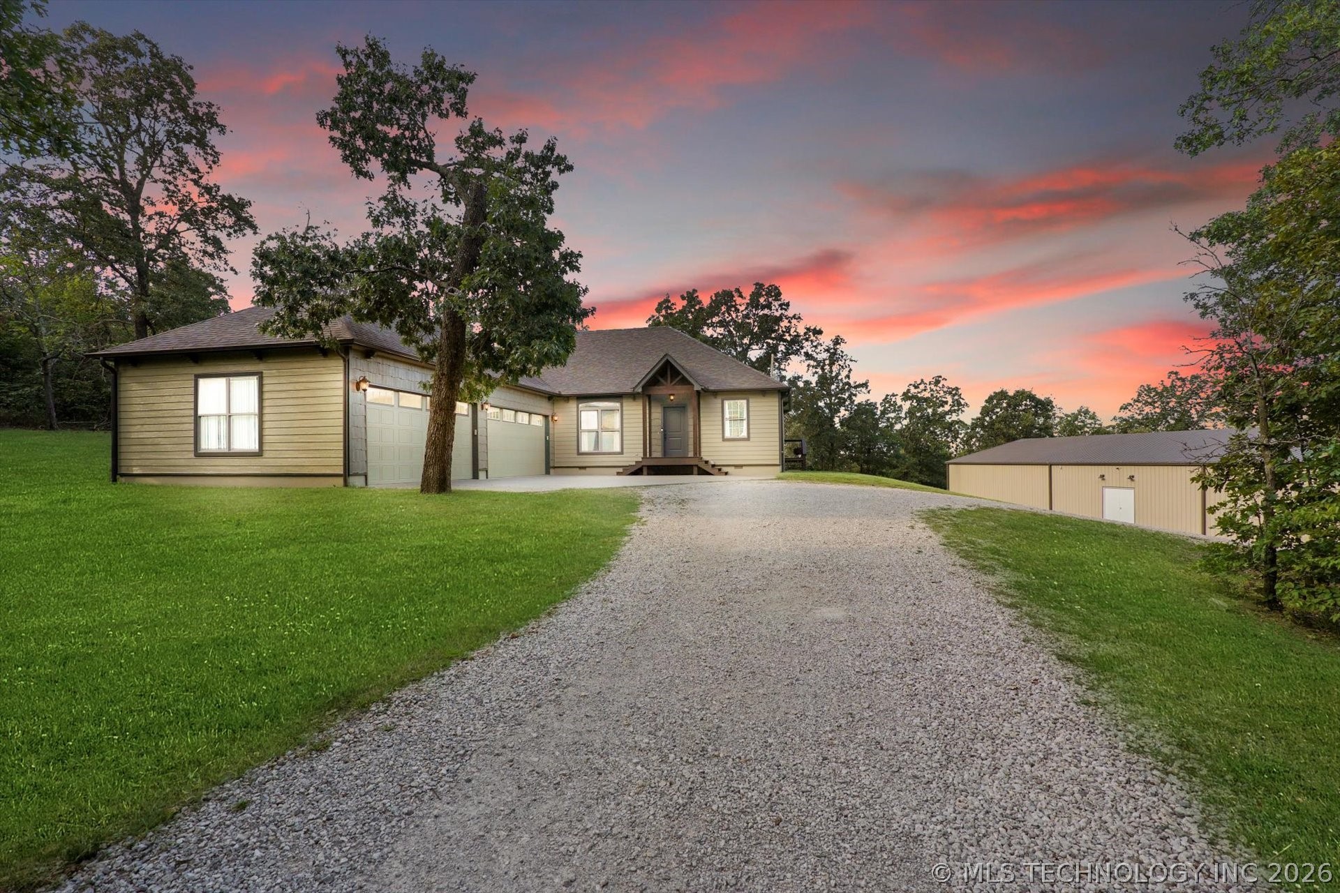 Craftsman-style custom home with mature trees on 4