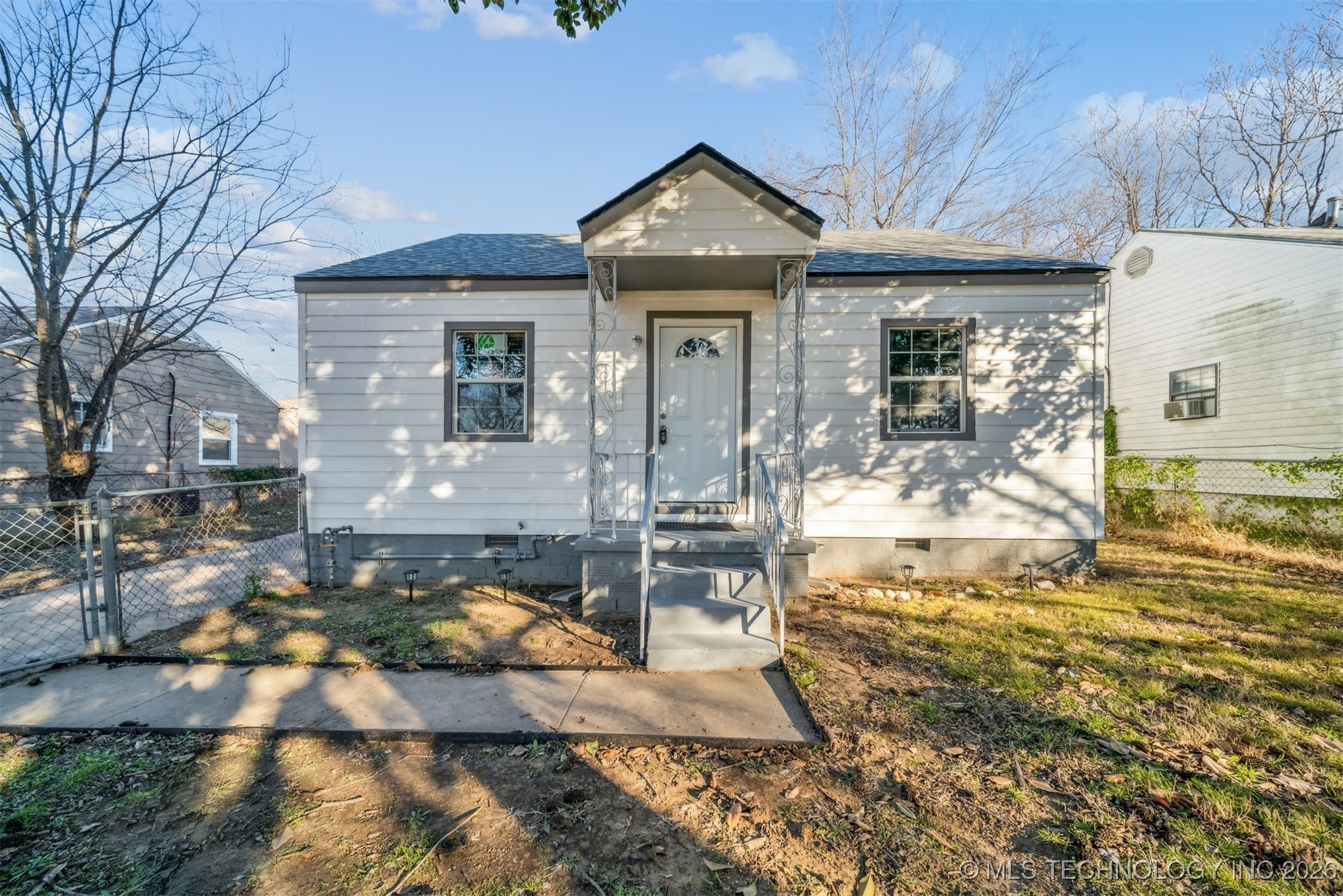 Charming front exterior with porch