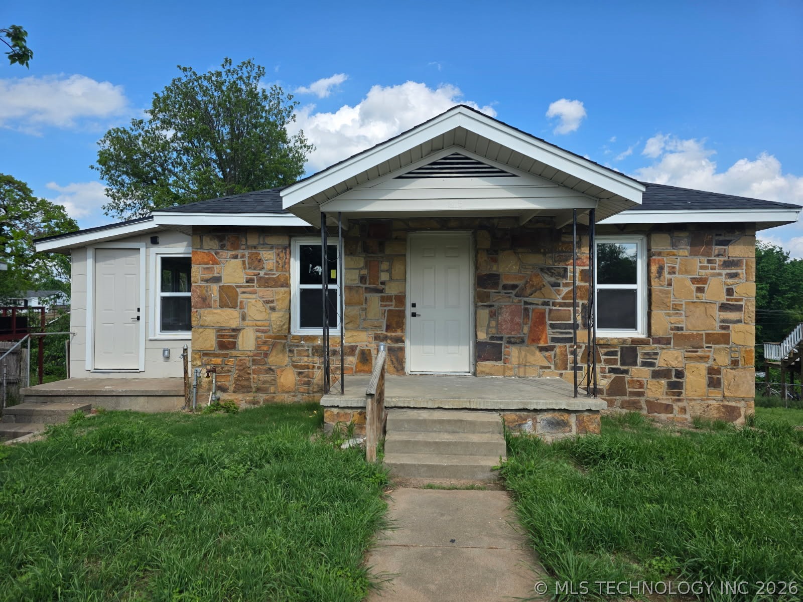 Photo 1 of 16 — 815 N Wilson Avenue, Sand Springs, OK 74063