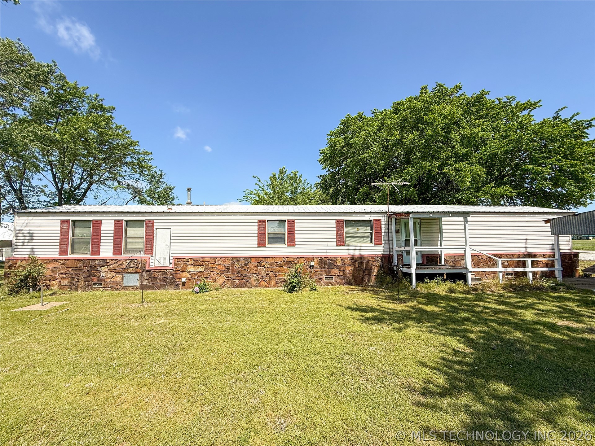 Photo 1 of 25 — 203 E Watova Street, Talala, OK 74080