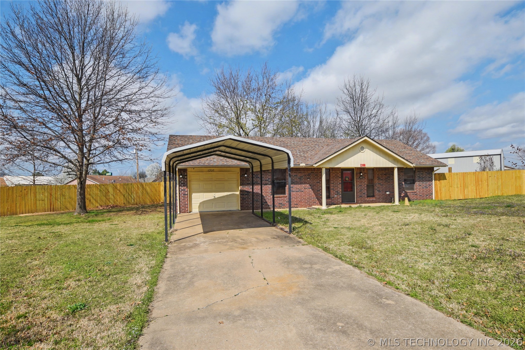 Photo 1 of 21 — 1208 SW 14th Court, Wagoner, OK 74467