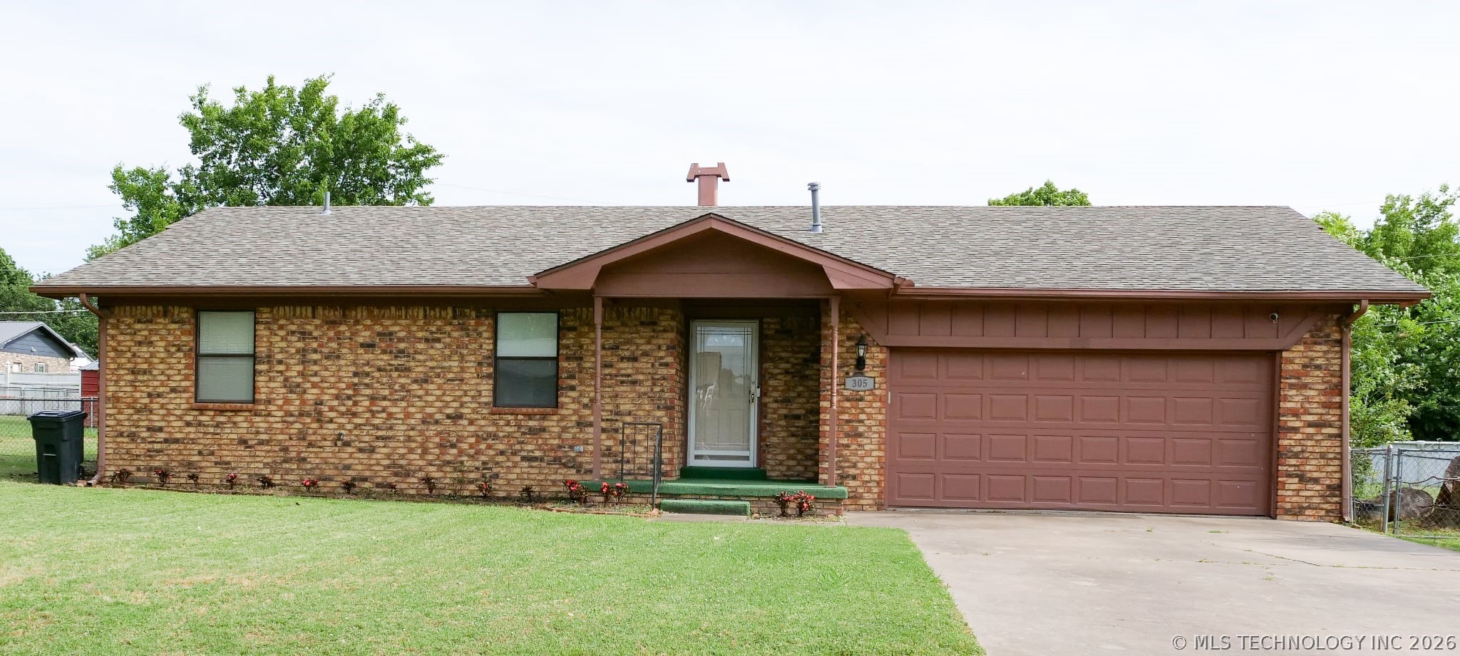 Photo 1 of 18 — 305 E Barclay Street, Henryetta, OK 74437