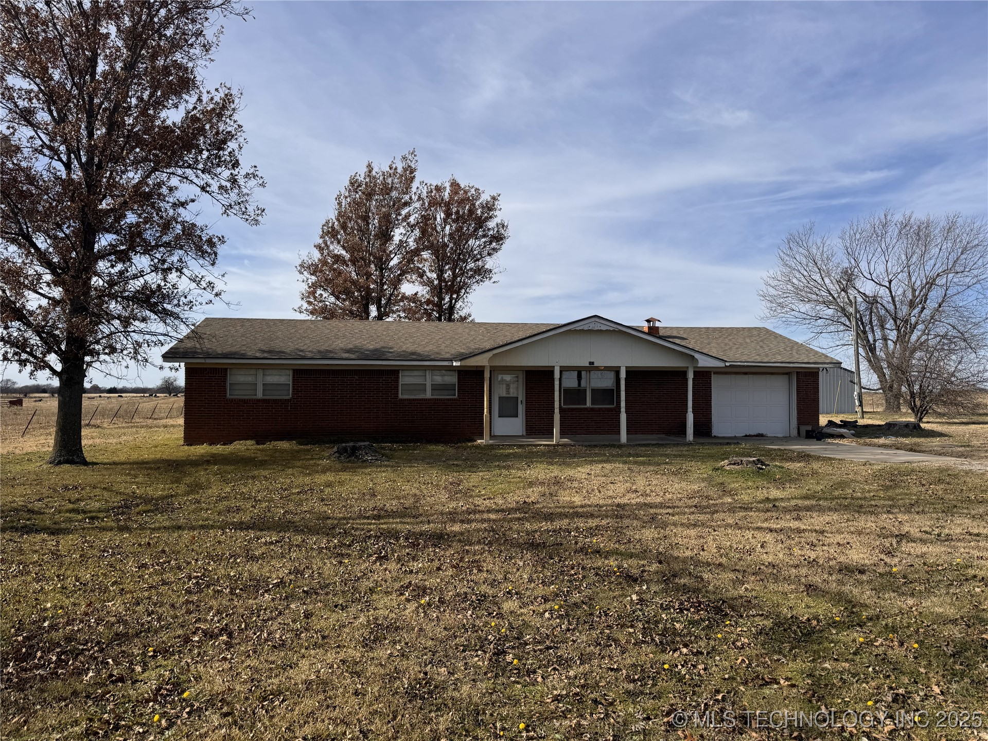 Photo 1 of 11 — 311 Jack Rabbit Road, Calera, OK 74730