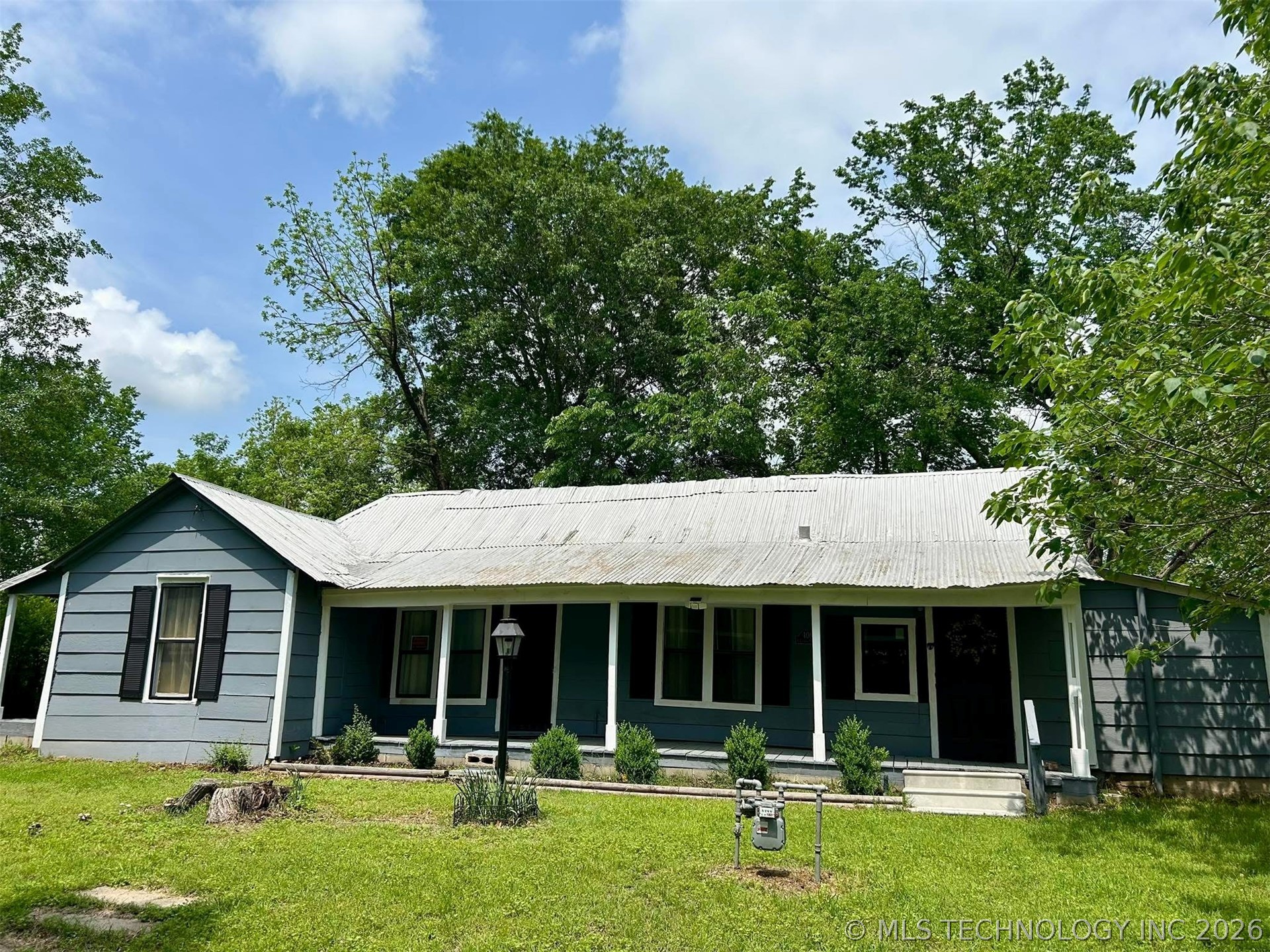 Photo 1 of 12 — 408 S Clark Street, Coalgate, OK 74538