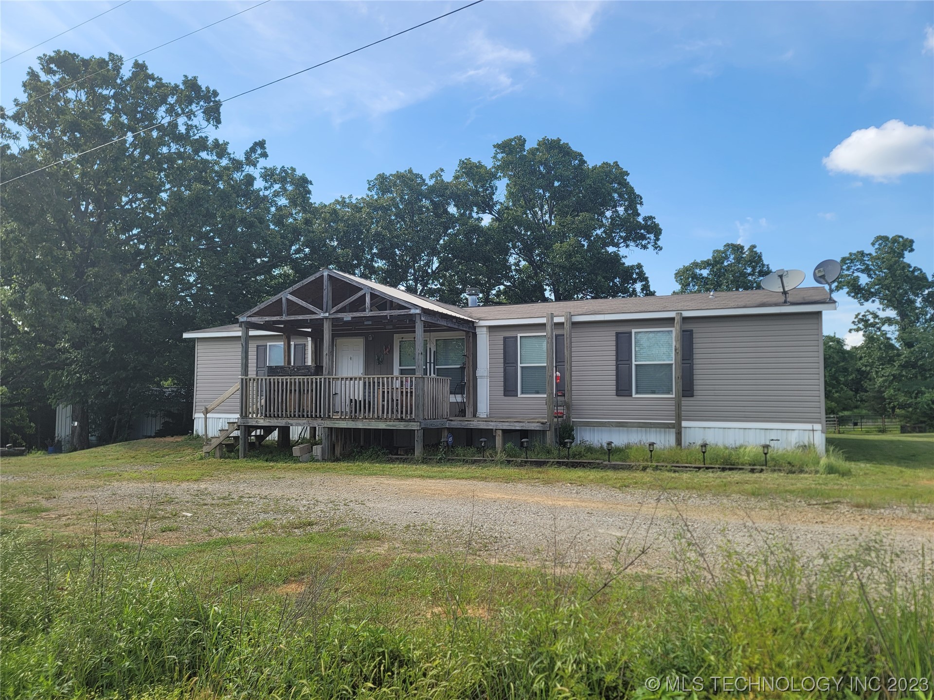 Photo 5 of 50 of 7016 E 303rd S mobile home