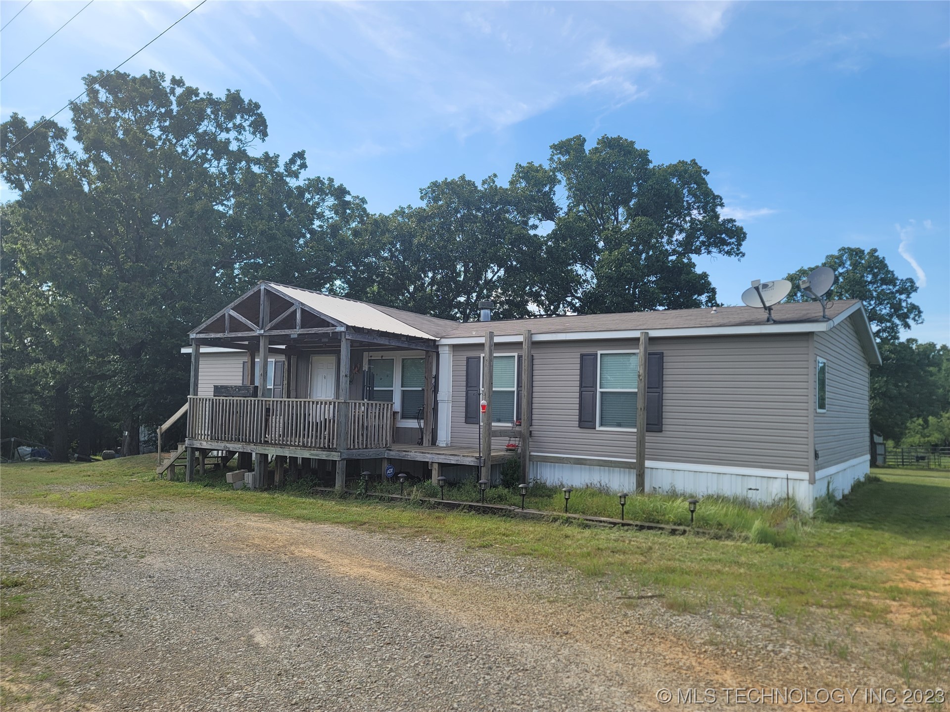 Photo 1 of 50 of 7016 E 303rd S mobile home