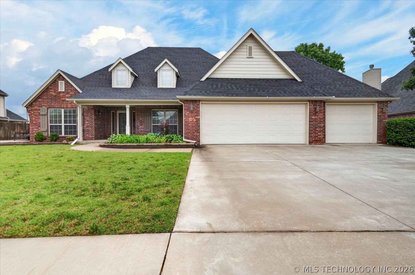 Photo 1 of 59 — 5817 Woodland Road, Bartlesville, OK 74006
