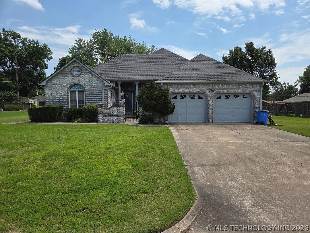 Photo 1 of 32 — 112 Circle Drive, Checotah, OK 74426