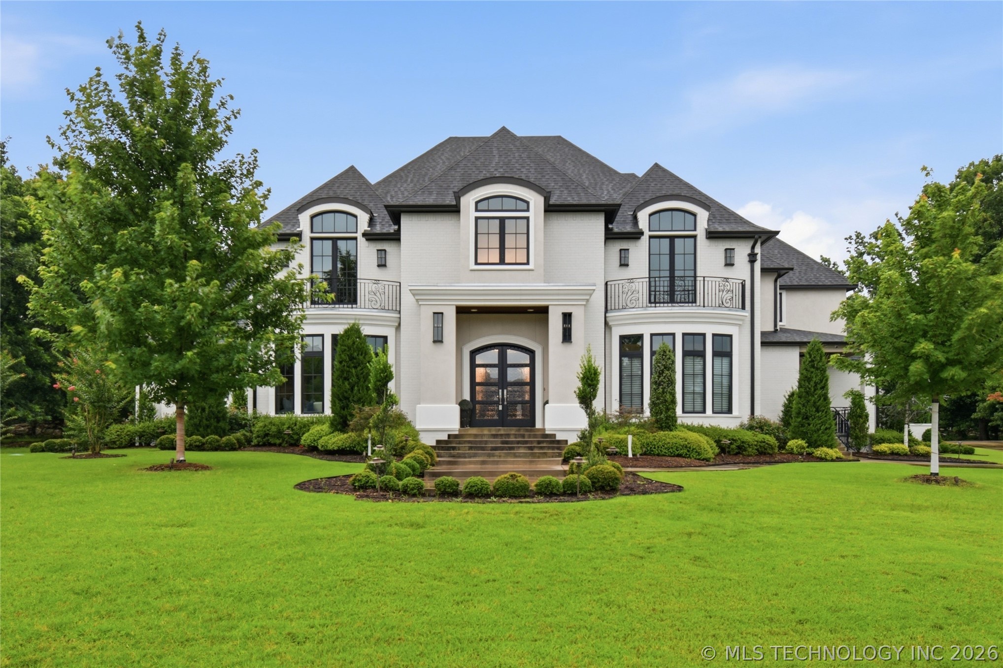 Stately front elevation featuring timeless archite