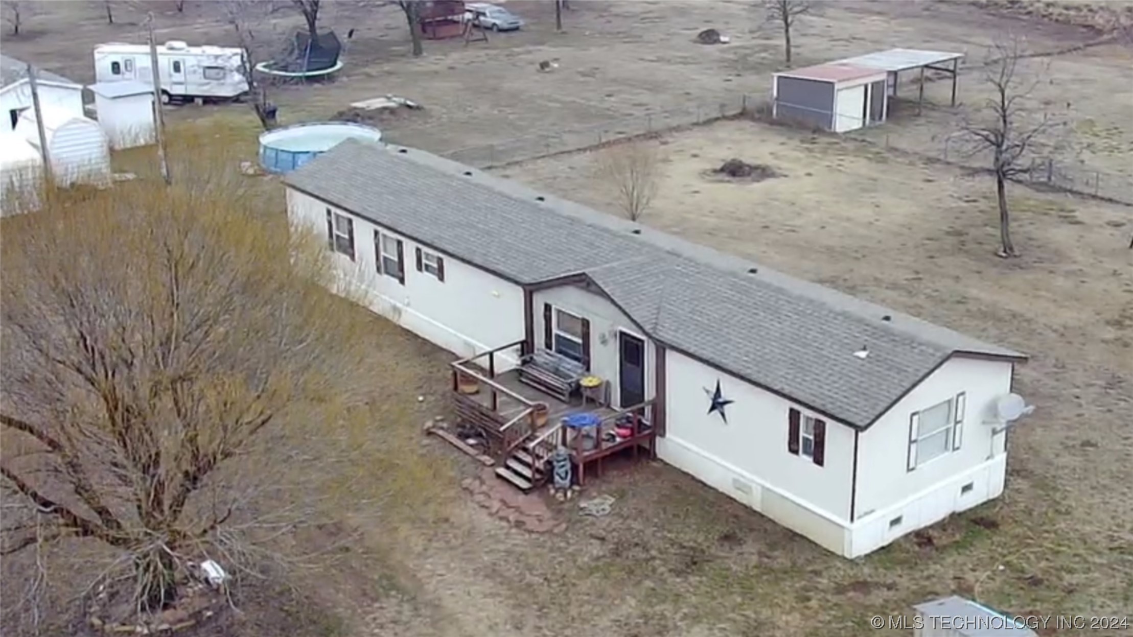 Photo 1 of 26 of 106108 Happy Trails Street mobile home