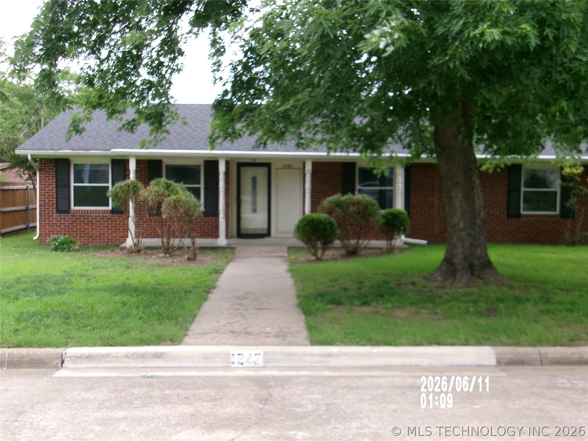 Photo 1 of 19 — 1242 Saddle Lane Unit 1, Bartlesville, OK 74003