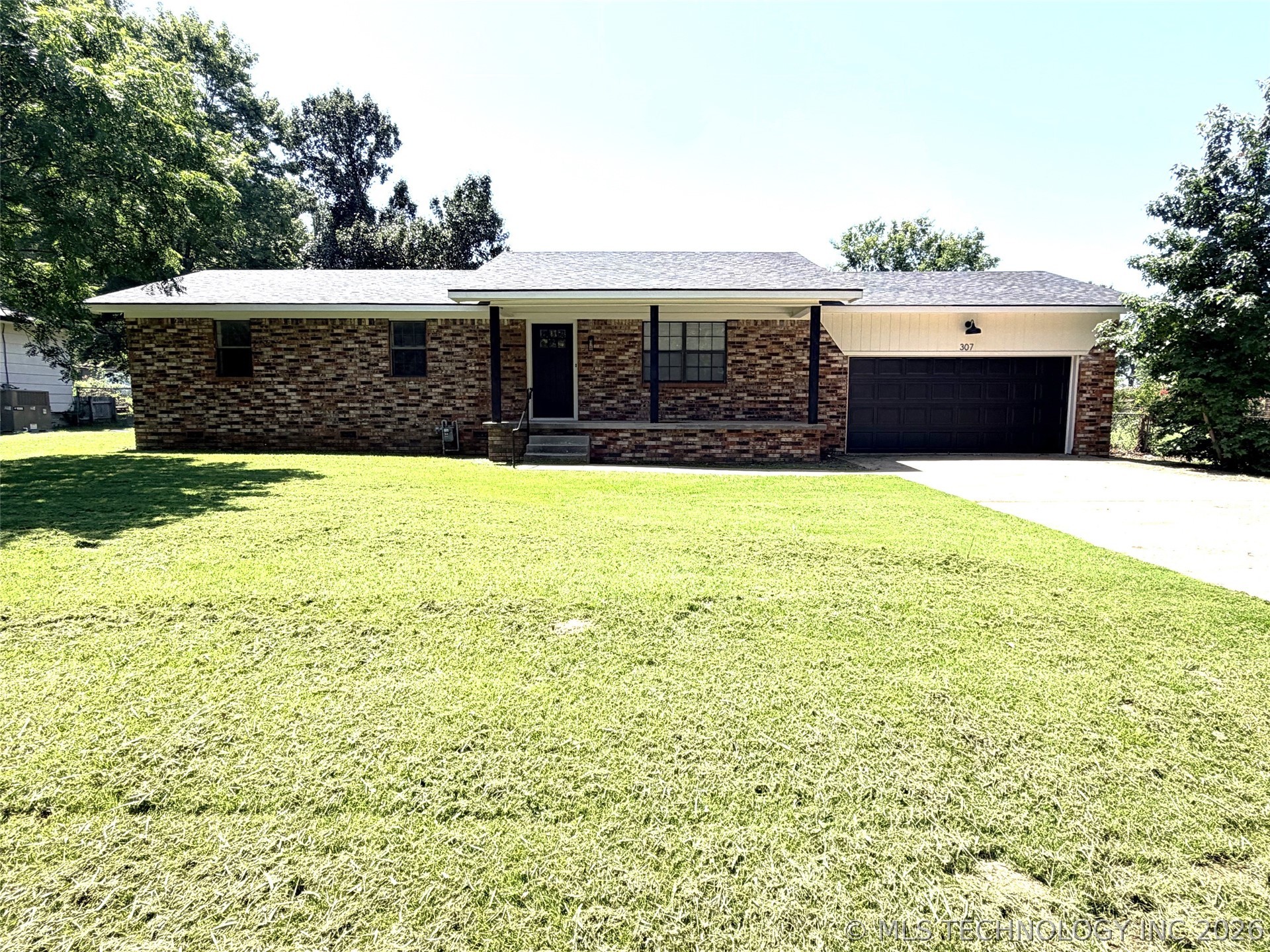 Photo 1 of 23 — 307 E Barclay Street, Henryetta, OK 74437
