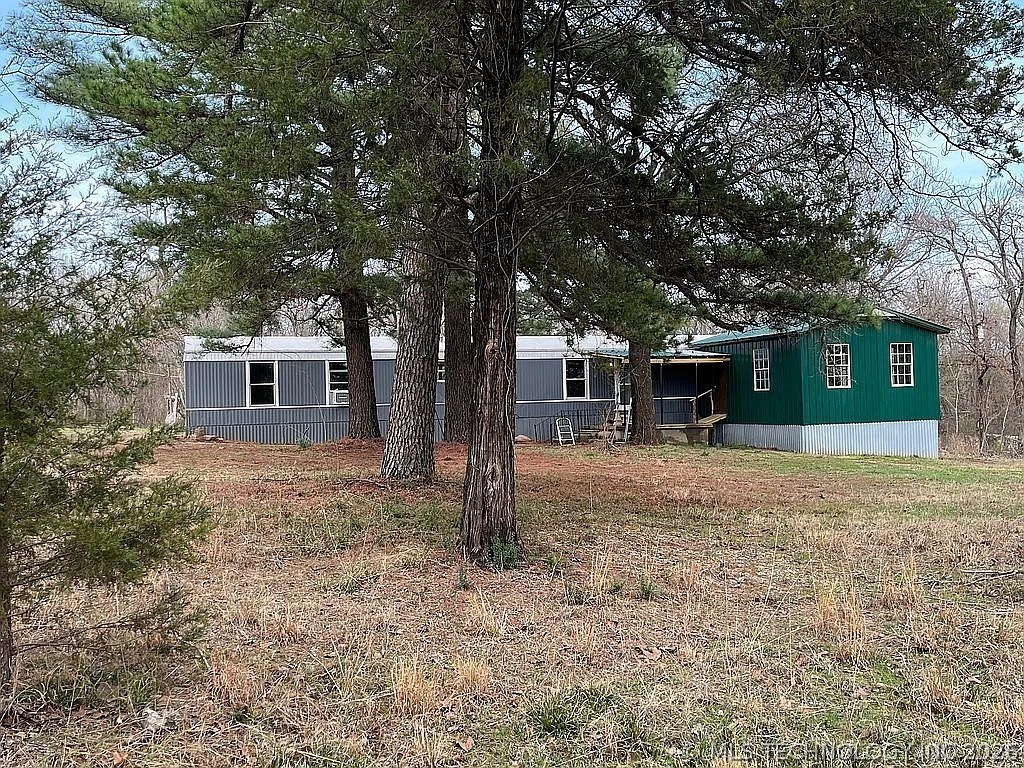 Photo 1 of 19 — 403993 E 1090 Road, Henryetta, OK 74437