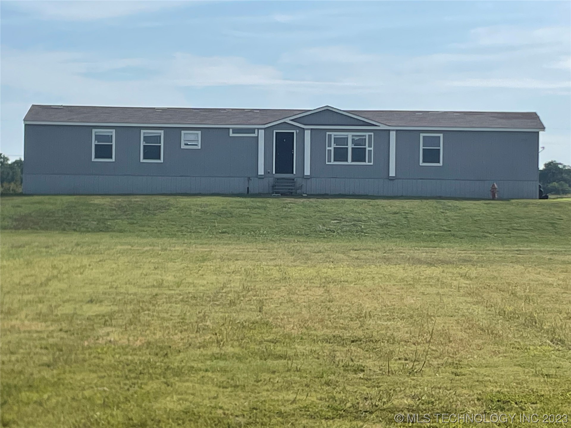 Photo 19 of 27 of 17205 S Garnett Road house