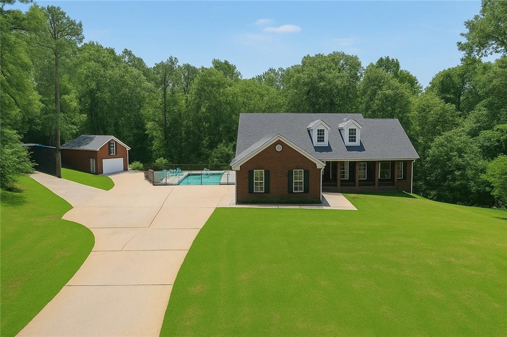 $0 Down with USDA or VA Loan !! Nestled on a partially wooded 3.71 Acre Lot, this stunning all brick home offers 4 bedrooms and 3 full bathrooms, providing ample space for families. This home features multiple versatile rooms that could be additional bedrooms/bonus, game room, office,man cave,gym, or a large media room.House has so many interior upgrades from granite counter tops in kitchen and bathrooms, primary shower, down to beautiful finished basement. They did not leave out the exterior with this expansive outdoor space that boast a stunning fenced in in-ground pool with patio and decking perfect for sunbathing,relaxing or entertaining.Property has single detached all brick garage with loft and paved Carport with more than enough parking for multiple vehicles. Have prettiest yard on the block and save money with your private well for watering. Inside home the primary bedroom features extra living space could be used for sitting area or even an office. Primary bathroom has been upgraded with new granite counter tops, tile flooring an master shower.Bedrooms are a split floor plan for privacy. Kitchen has stainless appliances , beautiful granite counter tops and white cabinets. Living room has open concept to kitchen and eat in dining with high ceiling.Dining room and mud room/laundry area has arched walls for a soft and elegant feature.Garage has been converted into a large media/ family room with beautiful flooring.Basement has been finished with make shift kitchen/storage area, large family/media room , game room/office, and bedroom with private full bathroom. This home has so much to offer! Schedule your showing today!