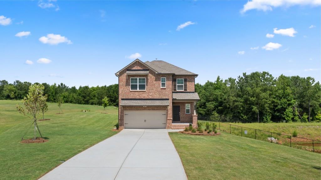 Welcome to the Magnificent Heritage Point Community, with large homesites you will be nestle in the heart of Hampton in Henry County, close to a golf course and lakes, but only minutes to Shopping, Restaurants and I-75. Beautiful Cul-de-sac homesite on a basement! The Boston plan has an open floorplan offering 36' kitchen cabinets with crown molding, granite countertops, stainless steel appliances package, gas range, a corner pantry in the kitchen and EVP flooring throughout main level. The open and airy family and dining room is a great space for entertaining family and friends. The second floor has 5 bedrooms and 2 bathrooms and a half bathroom on the main level. This home is move-in ready!
