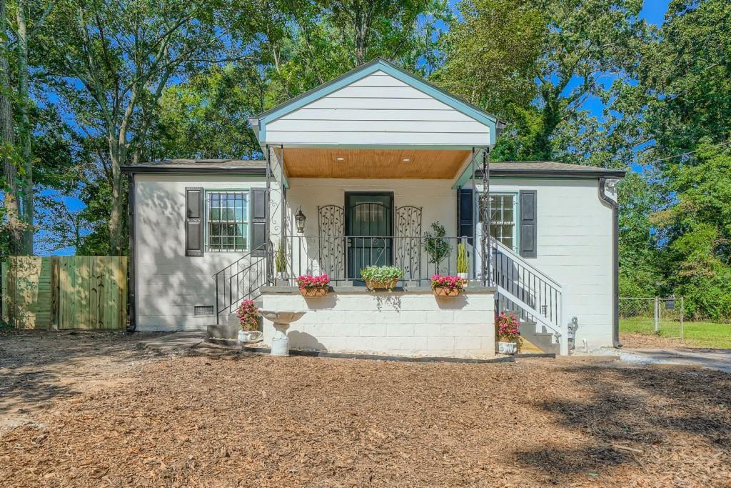 Fully Renovated Home for Lease. Move right into this cute and comfortable home featuring: Spacious family room and beautiful kitchen with new appliances * Laminate flooring throughout for easy maintenance * 2 bedrooms, 1.5 bathrooms * Washer and dryer included * Central AC for year-round comfort * Large fenced backyard with deck, perfect for outdoor living. Convenient Location: Just off Washington Rd (major highway) * Close distance to bus station * 5 minutes to MARTA East Point, 10 minutes to Tyler Perry Studios. This home is fully renovated, move-in ready, and ideal for anyone seeking comfort and convenience in a prime location. Tenants must carry Renter's Insurance.