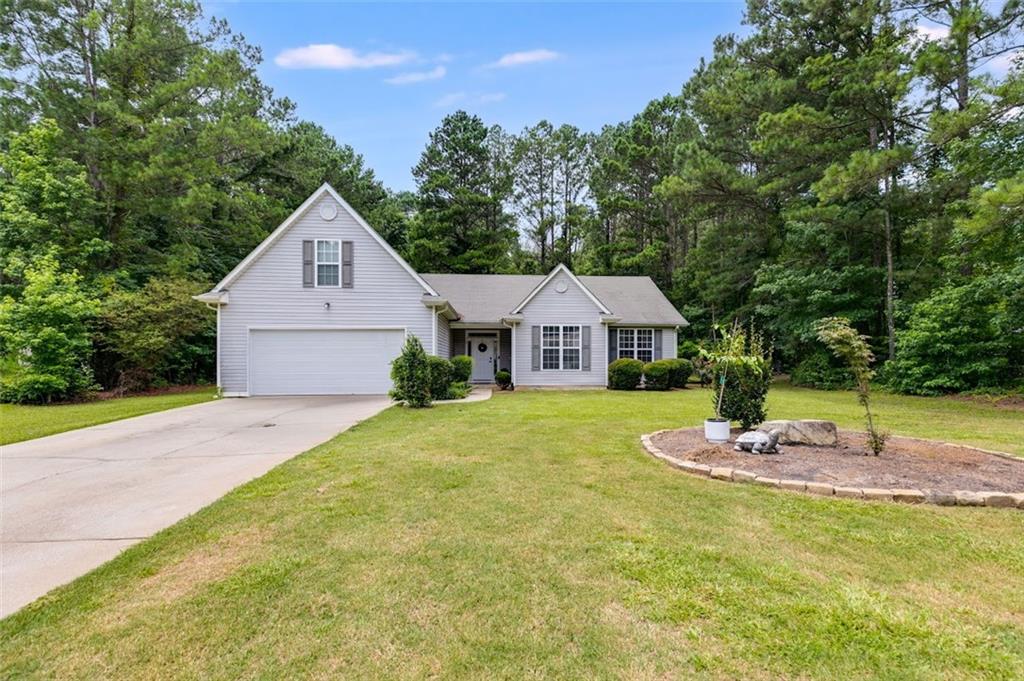 Welcome to this beautifully updated 3-bedroom, 2-bathroom home nestled on a spacious 1.18-acre lot, and features a large bonus room perfect for a home office, playroom, or extra living space. Step inside to discover a recently renovated kitchen featuring brand-new cabinets, sleek countertops, modern appliances, and fresh flooring. Perfect for everyday living and entertaining. Fresh paint throughout the interior gives the home a clean, modern feel. Outside, enjoy the expansive yard with plenty of space for gardening, recreation, or future additions. Don't miss this move-in ready gem! Schedule your private showing today!