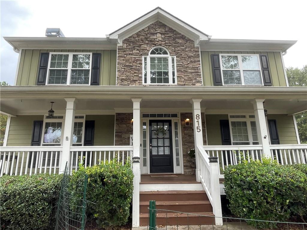 MOTIVATED SELLER - Location, Location, Location! This gem is ready for you to add your personal touches. Come home to spacious Southern living just ten minutes north of Marietta Square with the front porch you've always dreamed of! Enter into the welcoming family room with fireplace, hardwood floors, and a roomy country kitchen - Plenty of open space and storage throughout the home for comfortable living. Unfinished basement offers wonderful storage or an opportunity to finish for additional living space. Don't miss the charming crown molding throughout the home! The kitchen boasts stainless steel appliances, stone counters, and a separate dining room! The primary bedroom features tray ceilings, a beautiful double vanity, a separate shower, a spa-like soaking tub, and a large, walk-in closet! Two generously sized secondary bedrooms share a bathroom on the upper level in this split floorplan with laundry upstairs! Relax on the large back deck overlooking the scenic backyard. Beautiful, large, level, fenced lot with a giant Fig tree to start your garden!! Your dogs will LOVE this yard! Room to expand this adorable home or add a guest house, outbuilding, workshop, or garden! Just minutes from all the shopping in Town Center Kennesaw. Just minutes from Historic Marietta Square dining and EASY access to the freeway! Close to Kennestone Hospital, great schools, & more! No HOA! Great parking for your RV or travel trailer. Don't let this be the one that got away!
