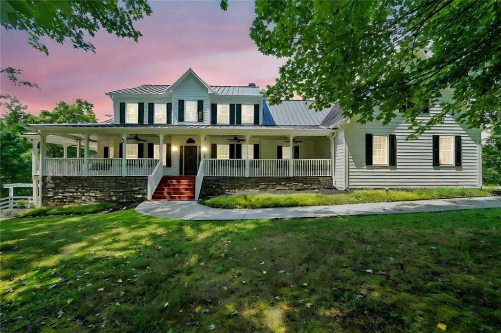 This private, tree-lined estate offers room to breathe on 4.69 acres—with no homeowners association to restrict your freedom. A saltwater heated gunite pool and spa, surrounded by professional stone hardscapes and lush landscaping, make the backyard feel like a true outdoor retreat. Whether you're hosting or recharging, this fenced outdoor living space is the kind of spot people talk about long after they leave.
Inside, a spacious kitchen anchors the home with granite countertops, a central island, double ovens, and not one but two walk-in pantries. The double-sided fireplace adds warmth and charm to both the living and formal dining areas. The main level features an owner’s suite with private views and a separate office for work-from-home convenience.
Upstairs, you'll find additional bedrooms and bathrooms offering room for guests or growing needs. The oversized laundry room and newer air conditioning units add to the home's practical side.
A wide wrap-around porch frames the front of the home—perfect for rocking chairs, evening chats, and quiet mornings with coffee. And yes, you're in the sought-after Creekview High School district.
If you’re looking for space, privacy, and smart features with long-term value, this home checks all the boxes.
