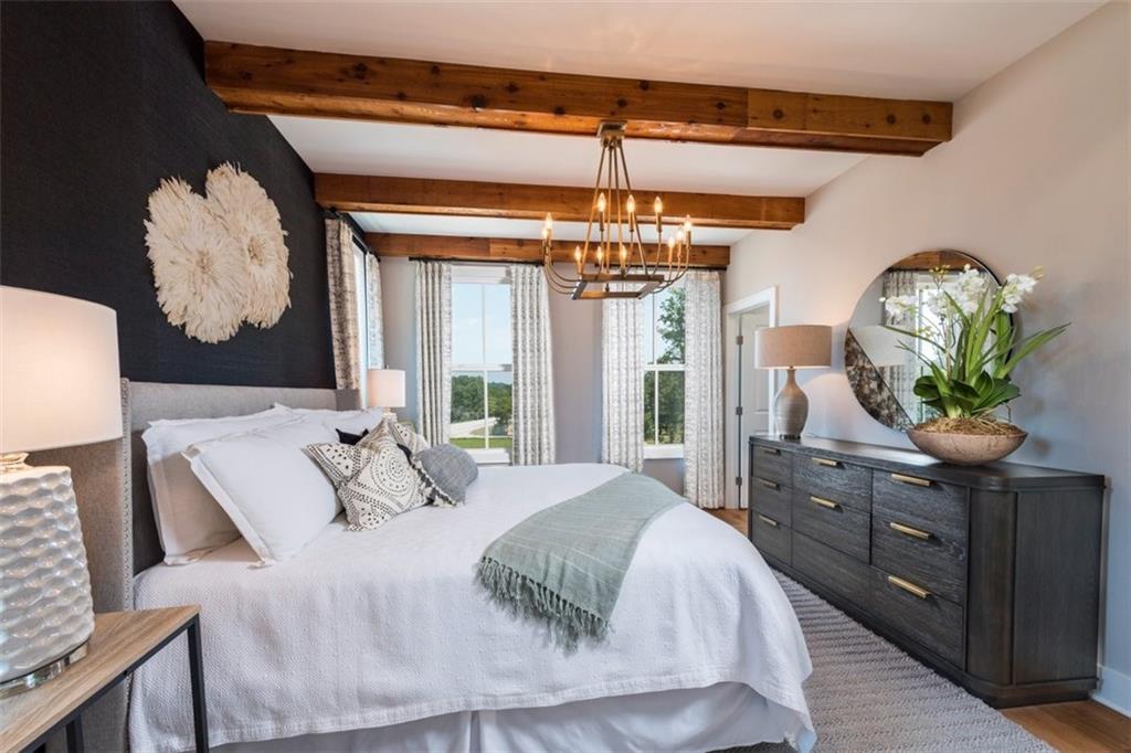 New Year, New Home, New You! ~Elevate your life in 2024 with a new home by The Providence Group and $20,000 Any Way You Want for Contracts Closed By February with 1 of our 5 Preferred Lenders!
The Chaucer Home Design is our largest plan sitting well over 25+ ft wide featuring 4 bedrooms & 3.5 bathrooms. Enjoy the wide split stair cases creating a dramatic raised foyer leading to the living room nestled in in the front of home with 3, 5 ft' bay windows. The 10 ft ceilings are sure to make your space bright and airy. Our dining area defines space, ideally situated in the middle of the room with 2 bump outs- perfect for an accent wall (brick, shiplap, geometric design) or dry bar area. The heart of the home is positioned in the back of the plan as everyone always gathers in the kitchen. Our oversized island is braced for a waterfall island. Kitchen cabinets and appliances sit on both walls creating plenty of storage space. Covered deck sit in the back of home catching South West sunsets. Wrapped stairs lead you to the upper level with guest bedroom 2 & 3 with full bathroom. Laundry room is ideally located outside of the owners bedroom plus a linen closet is mindfully placed next to laundry for ease. Oversized Owners suite showcases trey ceilings, 3 large 6 ft windows and plenty of room for oversized dressers and armoires. Owners bath includes vaulted ceilings with 10+ ft walk thru shower with drying area. MUST SEE! Owners closet will make you smile as we have even included a window. Terrace Level includes oversized 4th bedroom and full bath with walk in shower. Great suite for older visitors not wanting stairs or ideal office space as you are situated in back of home overlooking your fenced in backyard. Terrace also includes private entry through covered patio and coat closet outside of garage. enjoy oversized 2 car garage with under stair storage. 

Towns on Thompson- a boutique community of 48 townhomes combining luxury living with exclusive locality. Ideally situated on Thompson Street separating Downtown Alpharetta from Avalon, the possibilities are endless in the heart of vibrant Alpharetta! 
ESTIMATED COMPLETION: March 2024.  
~HOA: Dues include Professional Community Management. Landscaping. Comprehensive Building & Structural Insurance. Say Goodbye to roof maintenance, gutter cleaning, painting/staining, & landscaping! Let HOA cover repair & retreat of termite bond, weekly trash & recycling and so much more! *Homeowners have the optional right to join swim amenities at the Foundry*  [The Chaucer]