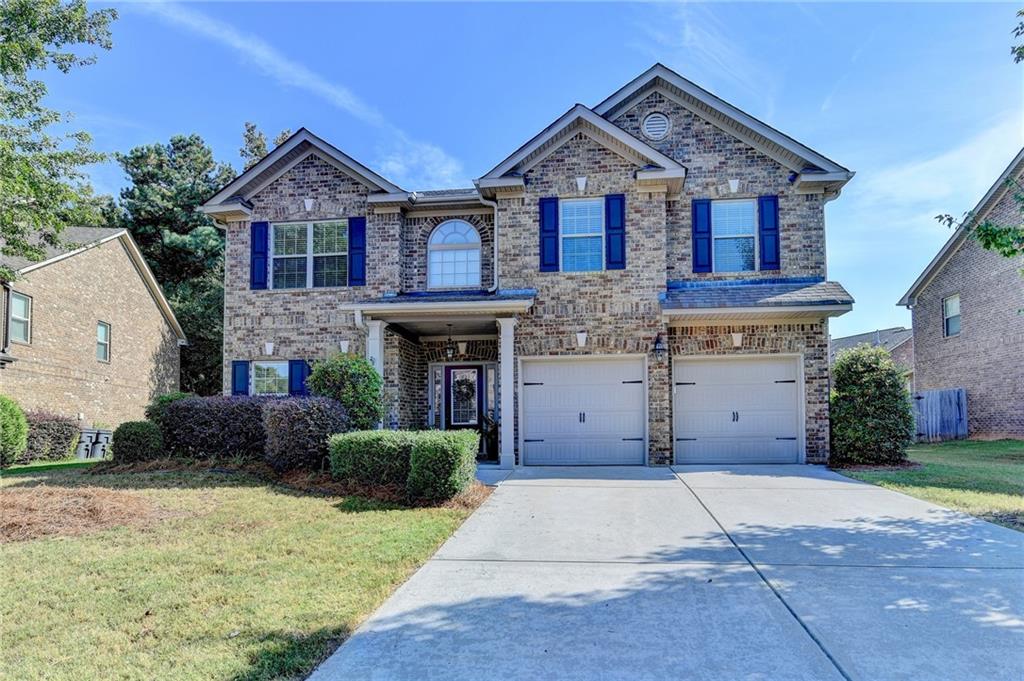 Welcome to this beautiful 4 bdrm/ 2.5 ba home in the sought after Loganville high school district, located in WALTON county, built in 2015! Walk into the front door to a 2 story foyer, family room, and large dining room that fits 12 comfortably (perfect for holiday gatherings and entertaining). The boasts of an open concept as the living room has a view to the kitchen, which includes granite counters, white cabinets, stainless steel appliances, and a large center island. Enjoy the low maintenance of this 4 sided brick home with a level, fenced in back yard with a shed and a large covered porch with custom shades and outdoor TV. Head upstairs to see the oversized master featuring a custom wall and custom walk in closet shelving system. The remaining 3 bedrooms are great sizes also and the laundry room is custom w/ a folding table, backsplash, and cabinet. This home is better than new with all its custom touches and brand new carpet - one you won't want to miss!
**Up to 1% in lender incentives available on your financing if using our Preferred Lender** Up to a $4,000 credit that can be used towards down payment or closing costs!