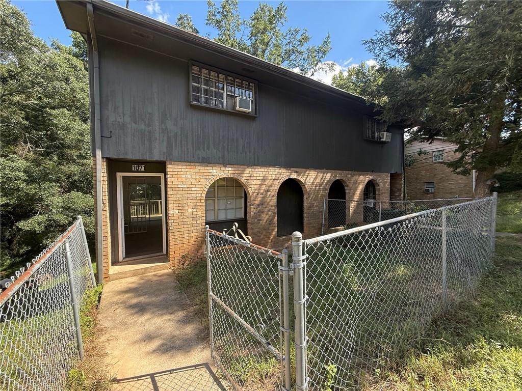 This fully renovated 3-bedroom, 2-bath home offers a rare combination of space, flexibility, and modern finishes across three levels. Technically a townhouse, this end-unit home is only attached by one wall offering the privacy and feel of a single-family home with the low-maintenance convenience of attached living.
Inside, you'll find fresh paint, brand-new luxury vinyl plank flooring throughout, and a clean, modern layout that works for a variety of living arrangements. The upper level includes two spacious bedrooms, a full bathroom, and a bright main kitchen with a brand-new refrigerator and plenty of cabinet storage. A private balcony adds outdoor living space just off the main floor.
The lower level features a separate studio-style suite with its own full bathroom, kitchenette, and private entrance ideal for a guest suite, home office, or bonus living space. Newly built interior stairs connect the levels, while still allowing privacy and flexibility. Step outside to enjoy a rear deck and a natural, peaceful setting with ample off-street parking.
With two kitchens, three stories, and a smart layout that supports work, life, and guests under one roof, this home stands out from standard rentals.
We take pride in offering well-maintained homes and work with tenants who value clean, comfortable living. All applicants are screened with credit, background, income, and rental history checks. Verifiable income of at least 2.5x monthly rent is required, along with no prior evictions or bankruptcies. A security deposit equal to one month's rent is due at signing.