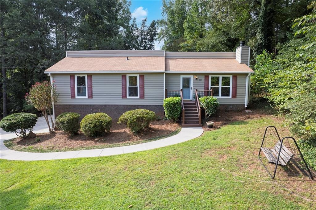 Just listed minutes from vibrant Downtown Woodstock! This move-in ready home sits in a quiet neighborhood with no HOA and boasts a host of recent pre-listing updates including fresh paint, new flooring, and a brand-new Trex deck.
Inside, you’ll find 4 bedrooms and 2 full bathrooms, a bright kitchen with stainless steel appliances, and a separate dining room. The inviting family room features a charming stone fireplace, while the heated and cooled Florida room offers year-round enjoyment.
The unfinished basement provides endless possibilities for storage or future expansion. Step outside to a large ½-acre lot, offering plenty of space for play, pets, or entertaining.
This Woodstock gem combines comfort, updates, and convenience in one package—don’t miss your chance to make it yours!