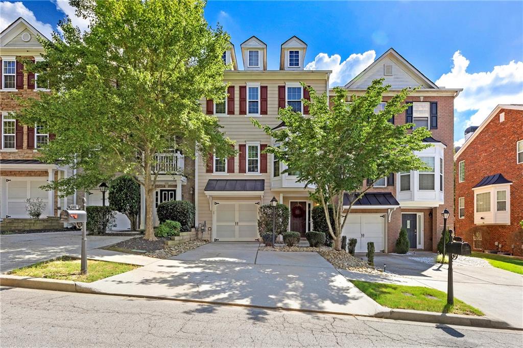 Welcome to this immaculately kept townhome, perfectly located in a beautifully maintained community within a top-rated school district! This spacious and inviting home features generously sized bedrooms, each with its own private bathroom — with new countertops in all secondary bathrooms for a modern touch. The serene master suite offers a double vanity, soaking tub, and a separate tiled shower for a spa-like experience.
The thoughtfully designed kitchen is a true showstopper, featuring a large, eye-catching island with plenty of cabinet space, including storage beneath the island, a stylish coffee/bar nook, and gleaming hardwood floors throughout the main level. French doors open to a private deck — perfect for enjoying morning coffee or hosting guests.
Additional highlights include brand-new energy-efficient windows installed just one year ago, backed by a 20-year transferable warranty — a valuable upgrade for future peace of mind.
Enjoy access to resort-style community amenities such as swimming, tennis, pickleball, and scenic walking trails. Conveniently located within walking distance to Fresh Market, popular restaurants, and just minutes from Suwanee Creek Park.
This move-in-ready home is the perfect blend of modern upgrades, thoughtful design, and unbeatable location — a true gem waiting for its next owner!