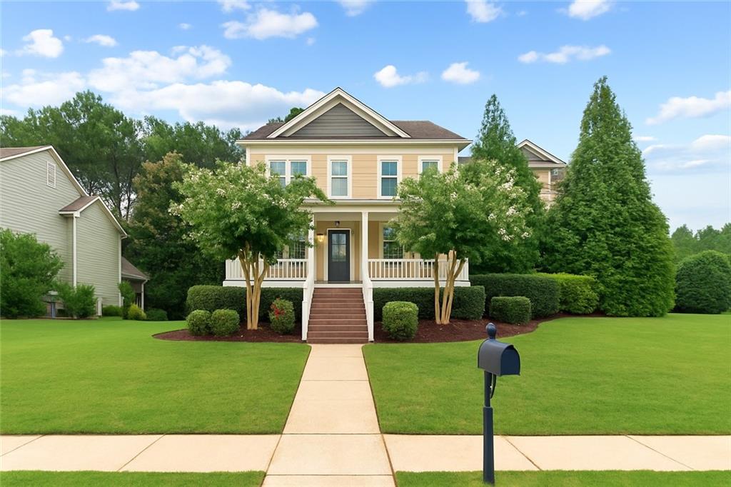 Welcome home to Legacy at the Riverline, where timeless Southern charm meets modern convenience. This beautifully updated 5-bedroom, 4-bath home is tucked away on an oversized cul-de-sac street lot in one of the neighborhood’s most desirable locations. From the moment you step onto the covered front porch, you’ll feel the warmth this home has to offer. Inside, you’ll be greeted with fresh paint throughout and gleaming espresso-stained hardwood floors that set the tone for elevated living. Main Level Magic: The heart of the home is the chef’s kitchen featuring real wood cognac cabinetry, stone counters, stainless steel appliances, a walk-in pantry, and a five-foot island, perfect for busy mornings or casual gatherings. The breakfast area flows seamlessly into the fireside family room with custom built-ins and onto a screened porch overlooking one of the best backyards in the neighborhood. The entry is flanked by a formal dining room and the formal living room, a perfect place to work from home or build your entrepreneurial dreams. Think: flat play space, a professionally landscaped wooded backdrop, and a cozy stone paver firepit area, your private outdoor retreat. And the real gem? A hard-to-find main-level guest suite with a full bath, ideal for visiting family, in-laws, or long-term guests. Do not miss the oversized side entry 2+ car garage. Upstairs Retreats: The second level offers flexibility and comfort with a media/playroom and a serene primary suite with trey ceiling, spa-inspired bath with jacuzzi tub, double vanities, and an enormous walk-in closet. You’ll also find a guest suite with a private bath, plus two additional bedrooms with a shared hall bath. Convenience is key with the upstairs laundry room. Community & Location
Legacy at the Riverline is a gated John Weiland Signature Community boasting resort-style amenities: swimming pool, tennis courts, playground, fitness center, and clubhouse. All this just minutes to the Silver Comet Trail, and with easy access to Hartsfield-Jackson International Airport and Atlanta’s vibrant westside, you’ll enjoy the best of both convenience and lifestyle. Why You’ll Love It: Fresh updates, the rare main-level guest suite, and one of the community’s best backyards make this home stand out. Whether you’re a family craving space or a frequent flyer needing quick airport access, this one checks all the boxes.