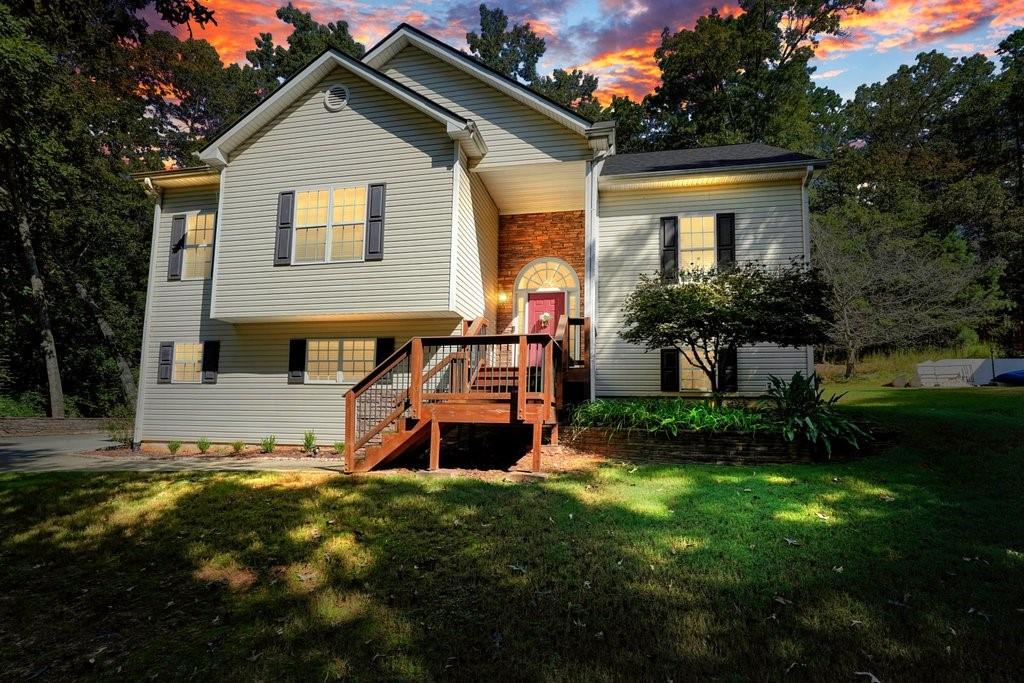 Tucked into the Fieldstone Neighborhood in Canton, 710 Bedford Trace blends function with warmth. The split-foyer layout offers a seamless flow from living to rest, and from work to play. The main level features tray ceilings, an open-concept living area, and a kitchen that’s equal parts beauty and utility—with granite counters, gas range, and stained cabinetry. Three well-sized bedrooms provide soft landings, each with carpet flooring for added comfort. The real surprise is downstairs: a mostly finished basement with flexible space for an office, bonus bedroom & bathroom, or media room - Maybe ALL 3! — your choice. Whether you’re sipping coffee on the spacious deck or swapping stories around the custom fire pit, this backyard was made for memories. A partially fenced area adds privacy without closing you in. Looking for flexibility? This neighborhood offers not 1 but 2 pools for summer entertainment! This one checks the boxes—now it's your move. Schedule your showing today before someone else calls it home.