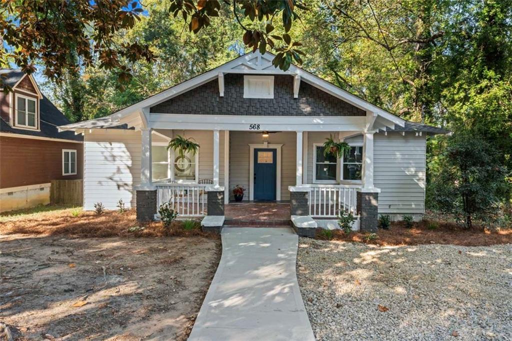 *** Price Improvement! Seller is offering MAJOR INCENTIVES to help you get a much better mortgage rate! $7500 in closing costs with preferred lender *** Welcome to 568 Woodlawn Avenue, a beautifully renovated gem nestled in the heart of Atlanta. This charming 3-bedroom, 2-bath home seamlessly blends modern upgrades with classic character, offering the perfect balance of comfort and style. As you step inside, you'll be greeted by a generous living space that flows effortlessly into the dining area and gourmet kitchen, complete with stainless steel appliances, quartz countertops, and custom cabinetry. The spacious bedrooms provide a peaceful retreat, while the updated bathrooms boast elegant fixtures and finishes. This home is not only aesthetically pleasing but also functional, featuring a new roof, HVAC system, and updated plumbing and electrical systems. Sit out on your new spacious deck and relax while over looking a serene greenspace. The private backyard is perfect for entertaining, gardening, or simply unwinding after a long day. The lot is large and level and extends well past the fenced area. Situated in a vibrant community, you're just steps away from the Atlanta Beltline and a short drive to the Mercedes Benz Stadium, Georgia Aquarium, Major Universities and Hospitals and everything Atlanta has to offer. Whether you're a traditional homebuyer or an investor, 568 Woodlawn Avenue offers a prime location and a move-in-ready experience. Schedule your private tour today!