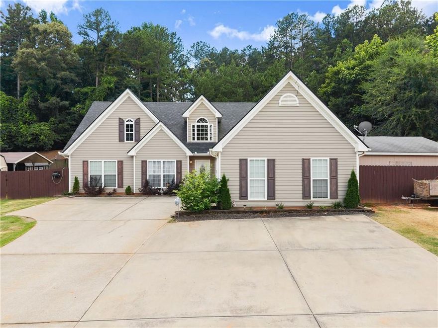 Charming Ranch with In-Law Suite, Saltwater Pool & Endless Possibilities in Sought-After Jackson County Schools! Welcome to your dream home! This beautifully maintained 4-bedroom, 3-bathroom ranch offers the perfect blend of comfort, space, and functionality—plus an in-law suite and backyard oasis you’ll never want to leave. Located in a quiet, non-HOA neighborhood within the highly desired Jackson County School System, this home is a rare find with endless opportunities.

Step inside to discover soaring ceilings in the spacious family room, seamlessly open to the kitchen featuring granite countertops, stainless steel appliances, ample cabinetry, and a dedicated ice maker. The formal dining room, with large windows and high ceilings, is perfect for entertaining or family gatherings.

The split floorplan offers privacy with a master suite that boasts two walk-in closets, dual vanities, a large tiled shower with frameless glass door, and a bonus storage area. Two additional bedrooms share an ADA-compliant full bath with another stylishly tiled shower. Upstairs, you'll find a private fourth bedroom with its own full bath—ideal for guests or a teen suite.

The finished garage has been thoughtfully converted into an in-law suite with extra storage, offering flexibility for multi-generational living, a home office, or even rental potential.

Outside is where this home truly shines! Enjoy summer days by the recently refinished gunite saltwater pool (PebbleTec finish), relax under the pergola, or entertain guests with multiple sitting areas and raised platforms. Need space for hobbies, storage, or a workshop? You’ll love the 20'x20' shop and 20'x36' shop, both with concrete floors and separate driveway access. The fenced backyard adds privacy and security for pets or play.

With tons of parking thanks to extra poured concrete out front and major updates including a newer roof, HVAC systems, and water heater, this home is move-in ready and waiting for you!

Conveniently located near Jefferson, Hoschton, and Braselton—you’ll be close to everything while enjoying peace and quiet at home.