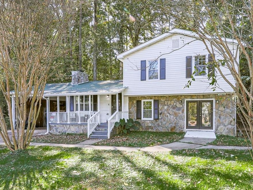 ** SELLER CONSESSION of $5,000 towards RATE BUYDOWN OR CLOSING COSTS & read below about $0 down financing **  Welcome Home to 87 Jones Street — perfectly situated in the charming Blue Ridge Mountain town of Jasper, Georgia. This NO HOA property offers the ideal blend of small-town convenience and modern comfort, located within walking distance of downtown shops, restaurants, parks, and more.

Freshly updated in 2024, this tri-level home features brand-new flooring throughout, fresh paint, elegant crown molding, recessed lighting, and an open-concept layout. The beautifully updated kitchen includes an island, stylish gray cabinetry, granite countertops, and newer stainless steel appliances — perfect for both everyday living and entertaining.

With 4 bedrooms and 2 bathrooms, the spacious Primary Suite is conveniently located on the lower level, easily accessible from the front sidewalk. The lower level also includes a large laundry room and an additional flex space ideal for a home office, gym, or hobby room. Upstairs, you’ll find three comfortable bedrooms and a generous full bathroom with a tub/shower combo. The main level features a bright, open-concept living area and a versatile bonus room that can serve as a dining area, office, gaming space, or playroom.

Step outside to enjoy the expansive side yard, peaceful creek, and lush, mature landscaping that provide both beauty and privacy. Unwind on the serene front porch and take in the fresh mountain air.

Located in the heart of Jasper, this solid, well-maintained home is move-in ready and waiting for its next chapter. Schedule your showing today and experience all that 87 Jones Street has to offer!

$0 Down ~100% Financing ~ No PMI loan may be available through a PATH Loan mortgage broker.  Contact us today to discuss making this home yours!