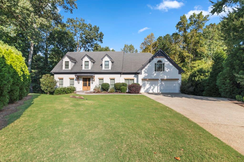 Welcome to this immaculate, updated 5-Bedroom, 4.5 bath modern farmhouse, comfortably situated on a tree-lined cul-de-sac, in one of the top-rated communities in the entire area - Medlock Bridge subdivision. This home exudes character and charm. The exterior of the home has been transformed from traditional to modern farmhouse with carefully placed details that give a nod to the original custom build. The well-manicured lawn serves as a subtle frame, while entering the driveway that provides access to the 2 car garage or basement level private entrance. The first level of this well-maintained home includes the primary bedroom with a newly renovated bath and closet system. This level also includes additional living spaces that include family room with wet bar, formal dining and serving room. The kitchen features a breakfast nook and new Kitchen Aid appliances. From the breakfast nook or family room, walk out to the oversized deck, that spans the length of the home. Enjoy a cup of coffee or take in the fresh air while overlooking the pool and backyard oasis filled with limelight hydrangeas. The second level of this charming home features three large storage spaces, an amazing loft for relaxation and entertainment, as well 3 bedrooms, each with access to a bathroom. Enjoy additional living space in the basement which includes a full kitchen, laundry room, game area, gym and bedroom. Step outside and enjoy the spacious, screened-in terrace, which is yet another wonderful space to entertain friends and family during warm Georgia summer days or brisk fall evenings. Enjoy the pool and spacious pool deck with friends and family for eight wonderful months of the year. This home is an entertainers dream. Consider being a part of this peaceful Atlanta suburb that boasts top-rated schools, safe communities, minutes away from top-notch grocery stores, as well as the future home to the 43-acre Medley, a new development that will feature retail, restaurant and entertainment spaces. We invite you to be part of this amazing Johns Creek home opportunity.