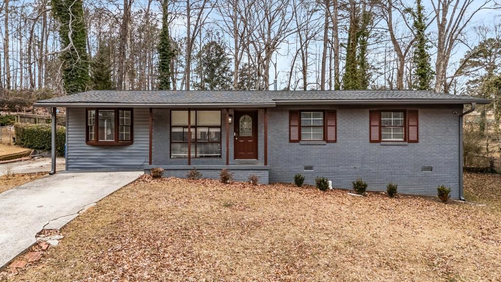 Discover the perfect blend of style and convenience in this fully updated 3-bedroom, 2-bath ranch home. Ideally located 20 minutes from downtown Atlanta and just 15 minutes from the airport, this property offers unmatched accessibility. Every detail has been thoughtfully upgraded: new roof, HVAC, and electrical system (2022) ensure long-term reliability, while the marble countertops elevate the interior's sophistication. Rain gutters (2022) with a warranty add peace of mind. The private wooded backyard is a serene escape, complete with a fire pit for cozy evenings. Best of all, this home has no HOA, giving you the freedom to make it your own.