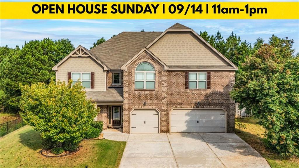*** For Video Tour: Type this into YouTube: 5 Bedroom | Buford City School Home | Flowery Branch, GA *** Welcome to this beautiful 3-sided brick home located in Flowery Branch, yet zoned for the highly sought-after Buford City School District—consistently ranked among the top in Georgia for academics, athletics, and community pride. Families move from all over to be part of Buford’s award-winning schools, making this home’s location a true standout. Situated on a level lot with only one direct neighbor, this home offers privacy and convenience with a spacious 3-car garage and inviting covered front patio. Inside, you’re greeted by a versatile office with French doors, followed by a formal dining room. The open-concept living room features a cozy gas fireplace, seamlessly flowing into the massive chef’s kitchen. This kitchen is a dream—complete with an oversized island, stainless steel appliances, double ovens, and a gas cooktop. Just off the kitchen is an entertainer’s haven, featuring a pool table, bar area, and even an electric dog door leading to a turf dog run. A half bath and walk-in pantry complete this main level. Upstairs, you’ll find two bedrooms with large walk-in closets connected by a Jack-and-Jill bathroom, as well as another full bedroom with its own bath access and a large additional bedroom for flexibility. The sprawling master suite includes a massive sleeping area plus a sitting room perfect for a nursery, home office, or gym. The luxurious master bath offers dual vanities, a soaking tub, and a stone walk-in shower. The master closet is truly remarkable, with two full walk-in sections and an additional linen closet inside. The backyard is an entertainer’s paradise with a covered patio, hot tub, fenced yard with wooded privacy, and turf dog run. Relax in the oversized pool spa with a built-in TV lift, or take advantage of the ample backyard space to add a full pool if desired. This home combines luxury living, incredible schools, and an unbeatable location—an opportunity not to be missed.