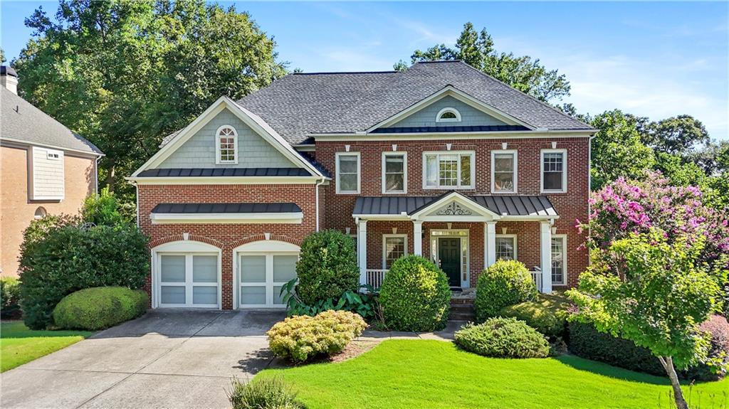 Come see this stunning home in the Parkside Section of Hamilton Mill located close to the clubhouse. This beautifully maintained 6 bedroom, 5 bath home offers elegant living space designed for both comfort and style. Step inside to discover a spacious layout that includes a 2 story foyer flanked by a large office/living room and a large dining room. Straight ahead carries you into the large family room with 2 story windows showcasing the private backyard. The large living room opens into a beautiful kitchen and dining area. Don’t miss the in-law suite on the first floor with walk-in shower. The finished basement includes a private bedroom, full bathroom, and large living room ideal for guests, multi-generational living or entertainment. Upstairs gives you 2 large bedrooms with a Jack and Jill bathroom and a small playroom/office in one of the bedrooms. The spacious master suite features a cozy sitting room and spa-like bathroom perfect for relaxing after a long day.