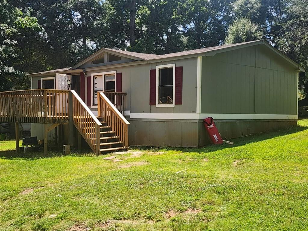 Wonderful opportunity to own this 3 bedrooms 2 bath home. Features family room with spacious kitchen and ample cabinets. Needs some TLC with lots of potential. The lot is fenced the home has a large front deck. Great opportunity for a new homeowner looking add value to a home or add to their investment portfolio.