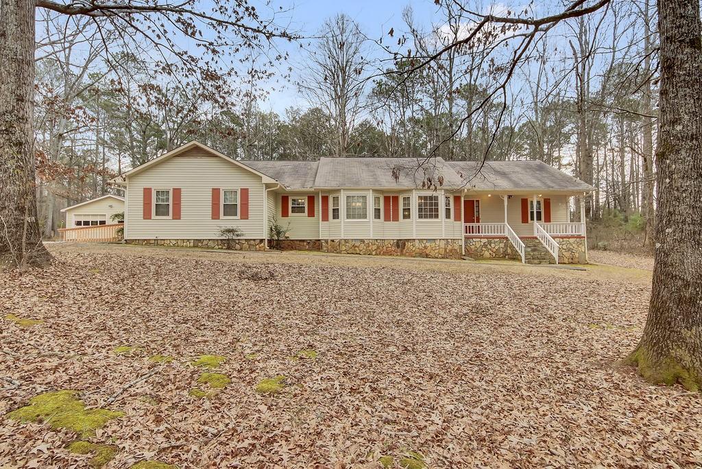 Welcome to 125 Bridget Dr in Hampton. Nestled on over 2 acres, this well-kept home offers the perfect blend of space, comfort, and functionality. Boasting a large family room, den, eat-in kitchen, dining room, and multiple bonus rooms, this property provides endless possibilities! Step outside to a fenced backyard, ideal for pets, entertaining, or simply enjoying the peace and privacy of your own outdoor retreat. The detached 2-car garage offers ample storage and parking, making this home as practical as it is beautiful. Enjoy the best of both worlds—plenty of land and privacy while still being conveniently located near shopping, dining, and major highways. Don’t miss out on this rare opportunity!