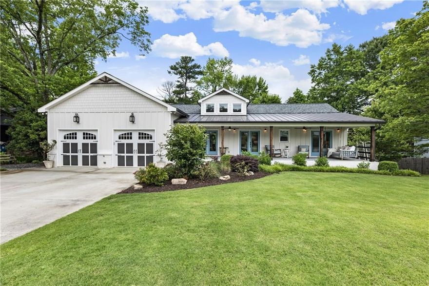 Rare, Fully Renovated Ranch with Basement in the Heart of Downtown Alpharetta. This is not your typical renovation—this designer home underwent a full rebuild, complete with a dramatic vaulted addition and two-level west wing expansion, transforming it into a one-of-a-kind modern farmhouse with timeless character and luxury finishes throughout. Perfectly situated on a flat, fenced lot in one of Alpharetta’s most coveted walkable neighborhoods, the home welcomes you with a bed swing front porch, stained tongue-and-groove ceiling, and dual ceiling fans—an idyllic spot for lazy summer evenings. The charm continues inside with three sets of French doors, a striking vaulted shiplap ceiling, and wide-plank hardwood floors bathed in natural light from high transom windows. The open-concept main level is anchored by a chef’s kitchen featuring: A large quartz island with seating,  Stainless steel appliances, including a 6-burner slide-in gas range, Custom vent hood, microwave drawer, French door refrigerator, and dishwasher, Porcelain apron sink, glass-front cabinets, floating shelves, and large pantry.  The open dining space accommodates both formal and casual gatherings with ease, flowing seamlessly into a spacious family room with multiple layout options. Down the hall, the laundry/mudroom is as functional as it is stylish, boasting a custom dog wash station, folding counter, hanging space, and future locker potential. Two secondary bedrooms share a beautifully appointed bath with a large walk-in shower.  Privately tucked away at the other end of the home is the primary suite retreat, featuring: A gas fireplace and designer accent wall, A spa-inspired bath with soaking tub, dual vanities, oversized walk-in shower, and custom closet with vanity, Private access to the screened-in deck with fireplace, easily convertible to a 4-seasons room for year-round entertaining. The finished terrace level offers even more flexible space with a guest suite and full bath, a gym/office/media room, and a huge unfinished area ideal for storage or workshop. Step outside to your private oasis offering a Flat, fenced backyard with covered patio, hardscape fire pit, goldfish pond, and raised garden beds, Expansive grilling deck perfect for dining alfresco under the stars! Additional upgrades include dual HVAC systems, whole-house water filtration, front and back irrigation, and an oversized driveway with parking for 6+ vehicles in addition to the two-car garage. All this just minutes from Downtown Alpharetta’s vibrant restaurants, shops, music venues, parks, trails, and weekly Farmers Market—accessible via a private neighborhood shortcut. Don’t miss this rare opportunity to own a completely reimagined home in one of Alpharetta’s most desirable locations.