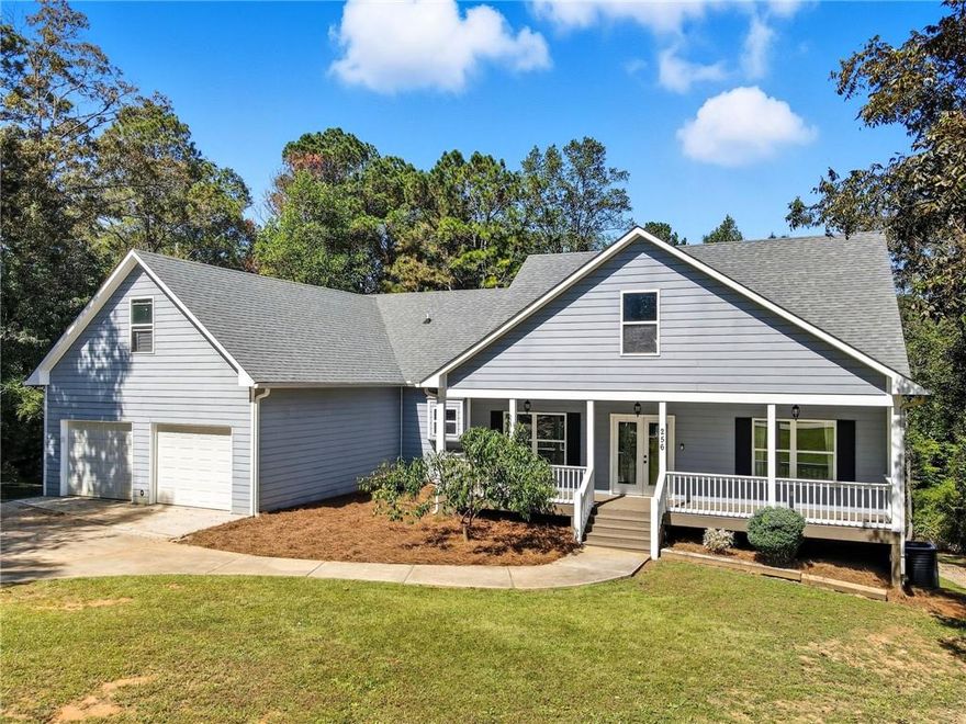 Welcome to Ball Ground, Georgia! This custom-built 5 bedroom, 3.5 bathroom ranch on a finished daylight basement sits on 5.95 acres and offers the perfect balance of space, privacy, and convenience.

Built in 2015, the home features a split-bedroom design with the master suite, laundry, and half bath on one wing, and two spacious bedrooms with a full bath on the other. The open kitchen overlooks the vaulted great room, making it the heart of the home for gatherings and entertaining. There is also potential to finish a room above the garage for even more living space!

The finished basement adds incredible versatility with two additional bedrooms, a full bath, a large living room, and a home office—perfect for multigenerational living, guests, or a private workspace.

Outdoor living shines with a rocking chair covered front porch, a large back deck that’s half covered and half uncovered, plus a screened patio area underneath. The fenced backyard is ideal for pets, play, or future expansions. The property itself combines open usable yard space with hardwoods in the back, giving you room to garden, ride, hike, or hunt right at home.

A true standout feature is the 35’x55’ (1,925 sq. ft.) three-bay shop, built in 2018 with 12’x12’ roll-up doors, water, and power—ideal for a workshop, home business, or storage for RVs, boats, and toys.

All of this with no HOA, county-only taxes, and walking distance to downtown Ball Ground, yet only minutes from shopping, dining, wineries, and I-575 for easy commuting.

Peaceful country living with room to spread out—right where you want to be!